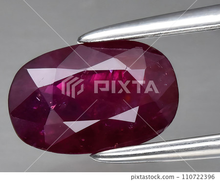 natural pink ruby gem on the background natural pink ruby gem on the background 110722396
