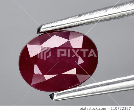 natural pink ruby gem on the background natural pink ruby gem on the background 110722397