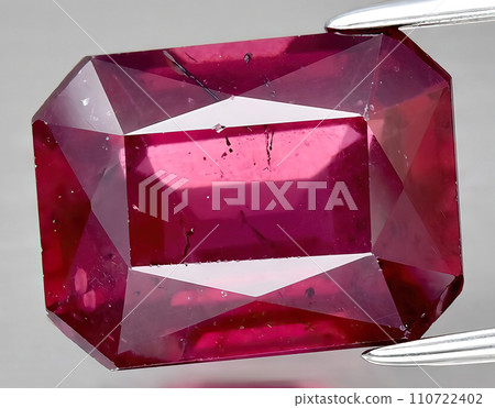 natural pink rhodolite gem on the background natural pink rhodolite gem on the background 110722402