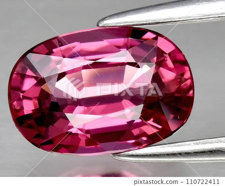 natural pink rhodolite gem on the background 110722411