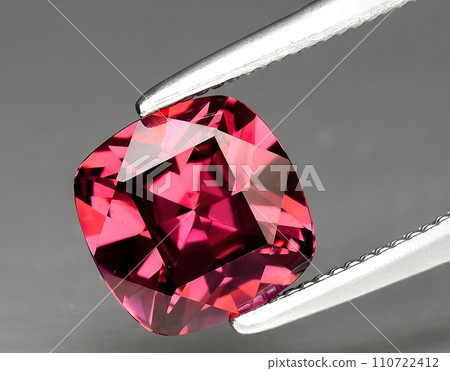 natural pink rhodolite gem on the background 110722412