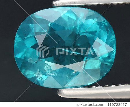 natural blue apatite gem on the background natural blue apatite gem on the background 110722457