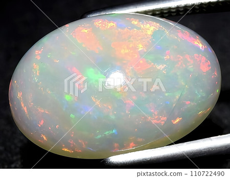 natural multi color rainbow opal gem on the background natural multi color rainbow opal gem on the background 110722490