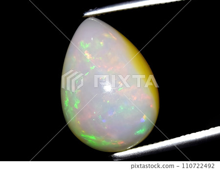 natural multi color rainbow opal gem on the background 110722492