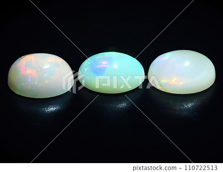 natural multi color rainbow opal gem on the background natural multi color rainbow opal gem on the background 110722513