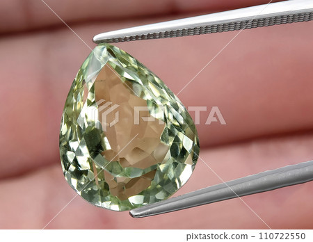 natural green amethyst prasiolite gem on the background 110722550
