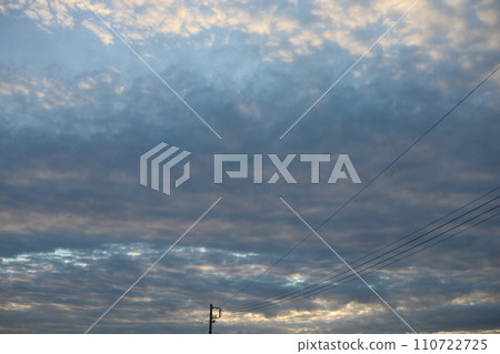 Clouds in the dusk sky 110722725