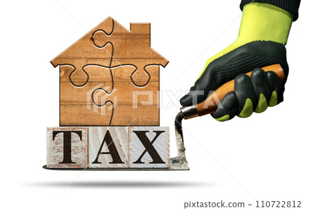 Tax Text made of Wooden Blocks on a Trowel with a Wooden House Tax Text made of Wooden Blocks on a Trowel with a Wooden House 110722812