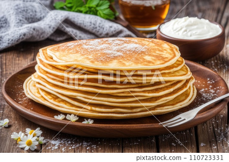 stack of very thin pancakes. traditional for Russian pancake week. Shrove tide 110723331