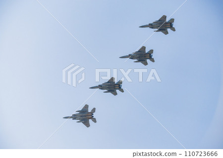 Fighters flying in formation 110723666
