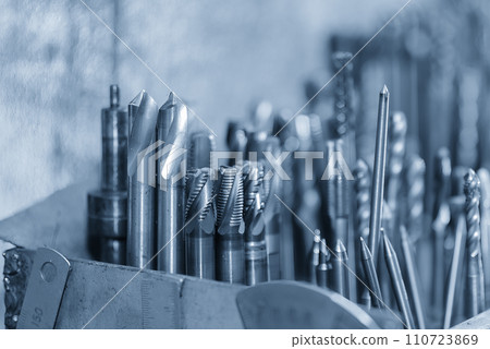 Close-up scene used rough cutter end mill tool in the light blue scene. Close-up scene used rough cutter end mill tool in the light blue scene. 110723869