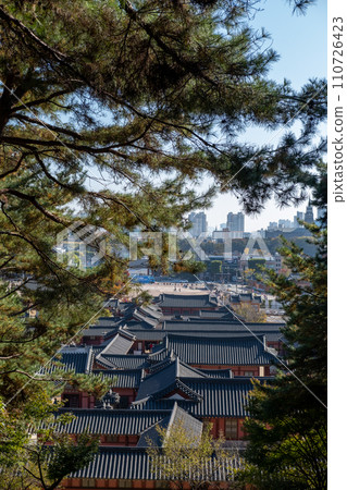 View of Traditional Korean Roof from above of Hwaseong Haenggung, temporary palace where the king used to stay when he traveled outside of Seoul, South Korea. It is famous as K-drama filming location. View of Traditional Korean Roof from above of Hwaseong Haenggung, temporary palace where the king used to stay when he traveled outside of Seoul, South Korea. It is famous as K-drama filming location. 110726423