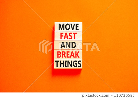 Move fast and break things symbol. Concept words Move fast and break things on wooden blocks. Beautiful orange table orange background. Business, move fast and break things concept. Copy space. Move fast and break things symbol. Concept words Move fast and break things on wooden blocks. Beautiful orange table orange background. Business, move fast and break things concept. Copy space. 110726585