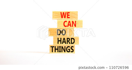 We can do hard things symbol. Concept words We can do hard things on wooden blocks. Beautiful white table white background. Business, we can do hard things concept. Copy space. 110726596