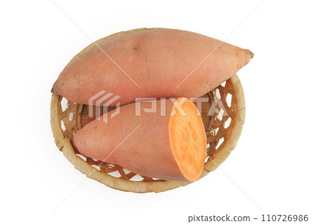 Sweet potato in a wicker basket isolated on white background. Top view. Flat lay Sweet potato in a wicker basket isolated on white background. Top view. Flat lay 110726986