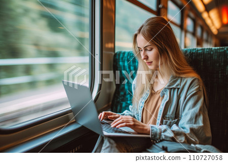 Digital Nomad Lifestyle: Caucasian Female Working Remotely 110727058
