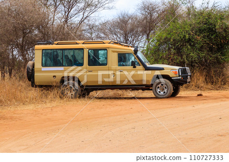 Off road car driving in Tarangire national park in Tanzania. Safari in Africa Off road car driving in Tarangire national park in Tanzania. Safari in Africa 110727333