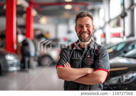 Contented Auto Expert on Break Surrounded by Cars 110727568