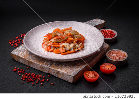 Delicious fresh stew with chicken or turkey with slices of sweet pepper and carrots Delicious fresh stew with chicken or turkey with slices of sweet pepper and carrots 110729923