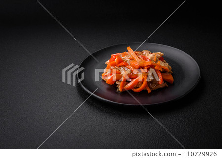 Delicious fresh stew with chicken or turkey with slices of sweet pepper and carrots 110729926