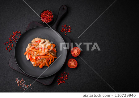 Delicious fresh stew with chicken or turkey with slices of sweet pepper and carrots Delicious fresh stew with chicken or turkey with slices of sweet pepper and carrots 110729940