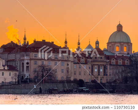 Prague bridge over a river with a city in the background Prague bridge over a river with a city in the background 110730110