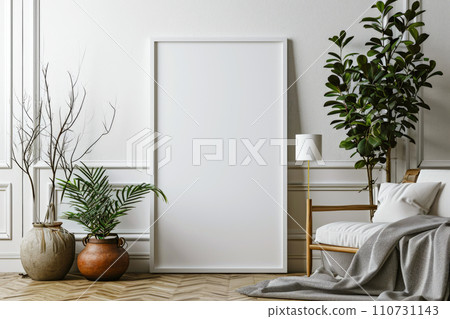 Frame mockup picture on floor near white wall in minimalist living room, Scandinavian interior with blank poster, green plants and sofa. Concept of vintage home design, eco 110731143
