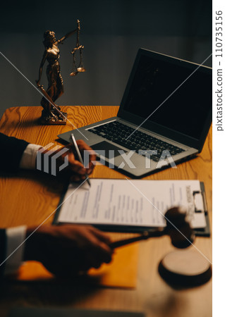 Judge gavel with Justice lawyers having team meeting at law firm background. Concepts of Law and Legal services. Judge gavel with Justice lawyers having team meeting at law firm background. Concepts of Law and Legal services. 110735156