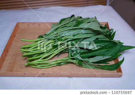 Water spinach on a plate 110735697