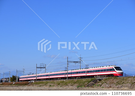 Tobu Isesaki Line Limited Express Ryoumo runs along the embankment 110736695