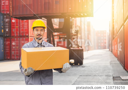 Japanese male smart worker working in container port cargo. Japan shipping logistics industry customs staff. Japanese male smart worker working in container port cargo. Japan shipping logistics industry customs staff. 110739250