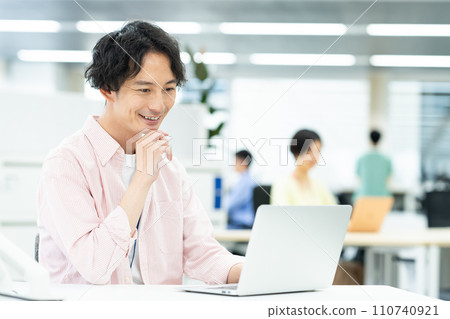 Young engineer working in the office 110740921