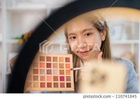 Beauty blogger, Woman teaching how to apply makeup, Recommended cosmetics, Record vlog streaming video. Beauty blogger, Woman teaching how to apply makeup, Recommended cosmetics, Record vlog streaming video. 110741845
