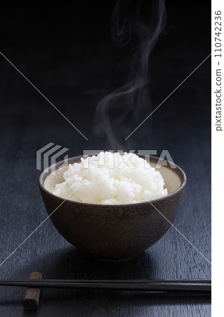 Freshly cooked rice, steaming white rice, new rice Freshly cooked rice, steaming white rice, new rice 110742236
