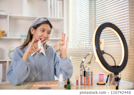 Beauty blogger, Woman teaching how to apply makeup, Recommended cosmetics, Record vlog streaming video. Beauty blogger, Woman teaching how to apply makeup, Recommended cosmetics, Record vlog streaming video. 110742448