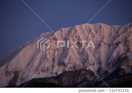 Snowy Mt. Hoki Daisen in Tottori Prefecture illuminated by the morning sun Snowy Mt. Hoki Daisen in Tottori Prefecture illuminated by the morning sun 110743230