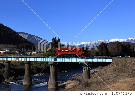 Nagara River Railway crossing the Nagara River with snow-capped Mt. Dainichigatake in the background Nagara River Railway crossing the Nagara River with snow-capped Mt. Dainichigatake in the background 110745179