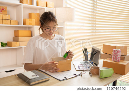 Packing box, Pack Products Into Postal Boxes To Deliver to customers, Sell products online, Freelance working. Packing box, Pack Products Into Postal Boxes To Deliver to customers, Sell products online, Freelance working. 110746292