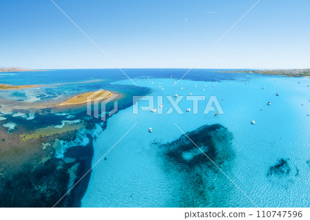 Drone view of a sailing yacht. Luxury transportation. Vacationing people. Vacation and holidays. 110747596