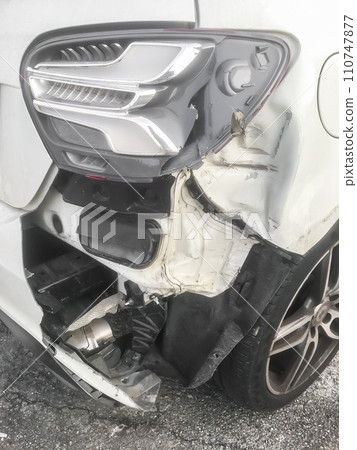 Carcass of white crashed car Carcass of white crashed car 110747877