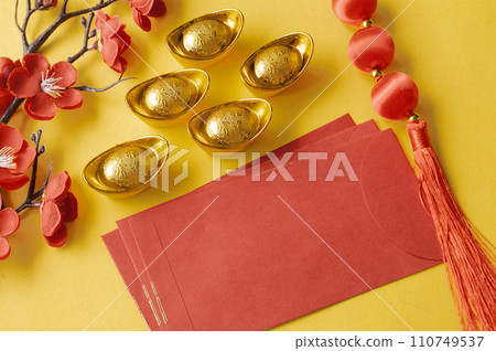 Chinese New Year red packet and golden ingot with customizable space for text or wishes. Chinese New Year celebration concept. 110749537