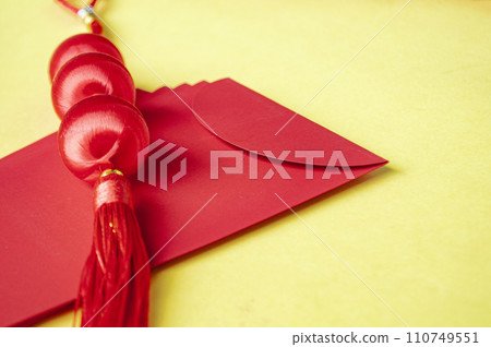 Side view of Chinese New Year red packet with customizable space for text or wishes. Chinese New Year celebration concept. 110749551