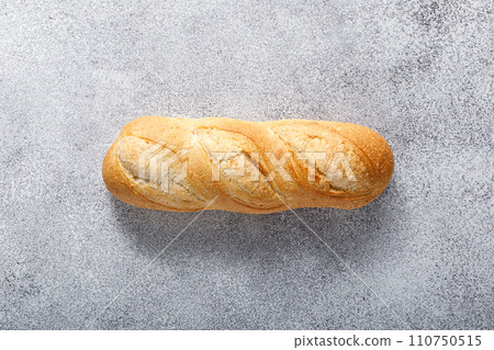 Bread, white baguette, top view Bread, white baguette, top view 110750515