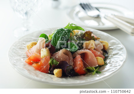Prosciutto Caesar salad 110750642