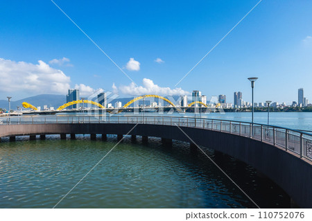 Dragon Bridge and Half Moon Bridge at the riverbank of Da Nang, vietnam Dragon Bridge and Half Moon Bridge at the riverbank of Da Nang, vietnam 110752076