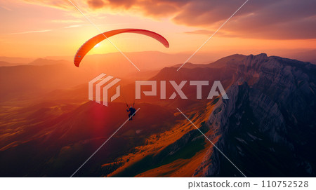 AI-generated content. Paraglider silhouette flying over above green hills and mountains at sunset. Beauty world. Extreme sport.  110752528