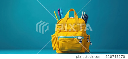 an outfit includes school supplies in the back of yellow backpack 110753270