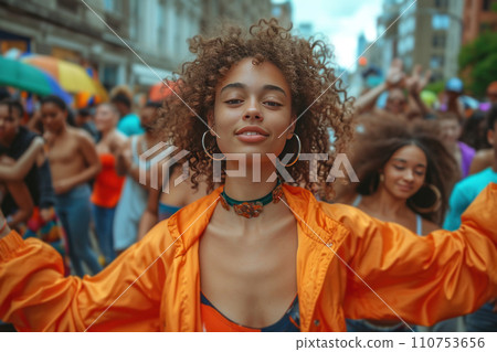 an african american woman dances in the street with others in bright an african american woman dances in the street with others in bright 110753656