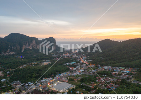 Aerial top view of Samet Nangshe, Phang Nga with city town, lush green trees from above in tropical forest in national park in summer season. Natural landscape. Pattern texture background. 110754030