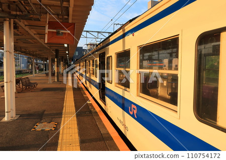JR Kyushu, Sasebo Line train window view from Sasebo Station to Hayaki Station (early morning) JR Kyushu, Sasebo Line train window view from Sasebo Station to Hayaki Station (early morning) 110754172